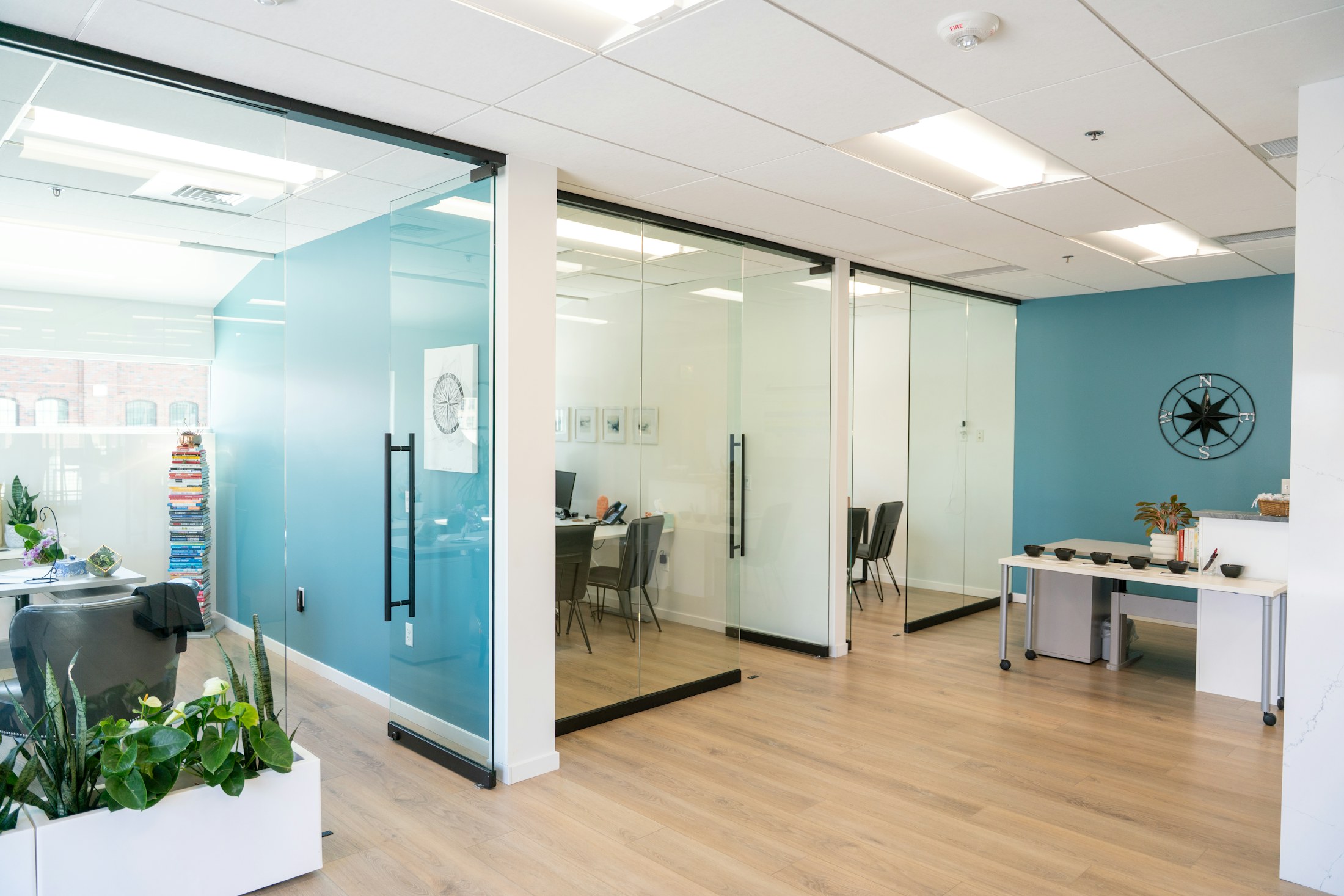 A calm collaborative workspace with warm natural light
